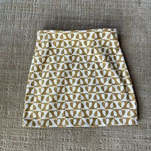 Mustard yellow corduroy mini skirt with heart pattern